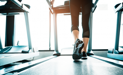 Woman walking on a treadmill