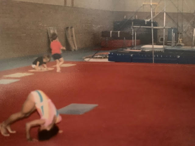 Corynne Cooper as a child doing a somersault. 